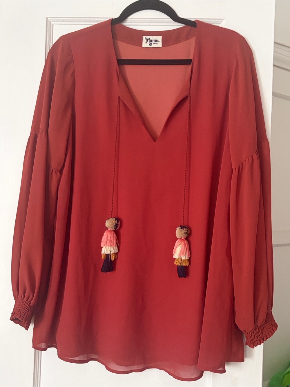 Show Me Your MuMu Rust Red Tassel Peasant Tunic Size S, it has extra room.